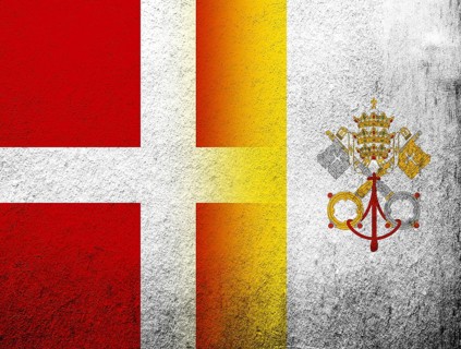 The Kingdom of Denmark National flag with National flag of Vatican City. Grunge Background