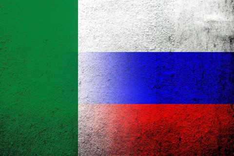 National flag of Russian Federation with Republic of Nigeria National flag. Grunge background