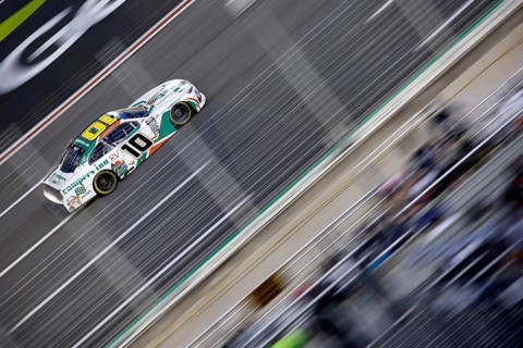 NASCAR Xfinty Driver, Justin Haley (10) races off turn four during the Alsco Uniforms 250 at the