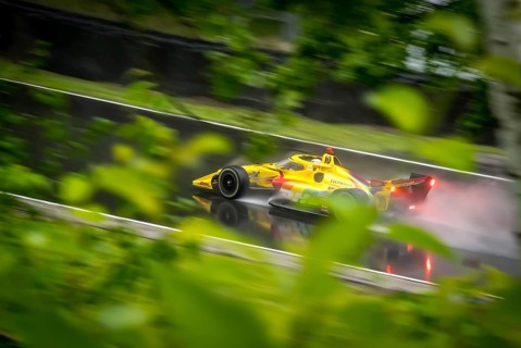 ALEX PALOU (10) of Barcelona, Spain comes through turn 12 (Canada Corner) during a wet practice