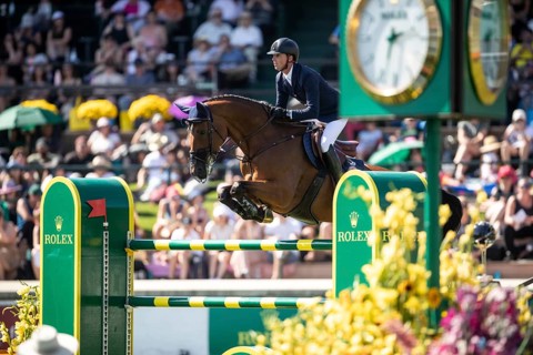 Ben Maher of Great Britain and riding Dallas Vegas Batilly compete in the first round of the 1.60m