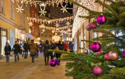 Beautiful Christmas decorations on Herrengasse street, at night, in the city center of Graz, Styria
