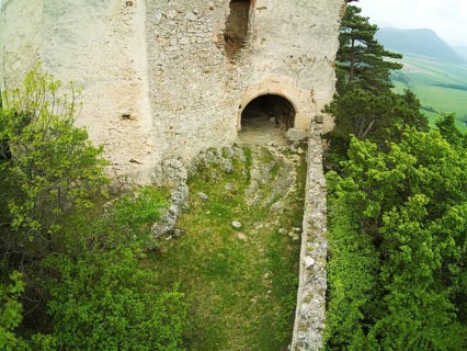 High angle view to a castle ruin in the wood