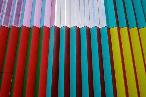 Colourful façade of the Mira shopping centre on the Nordhaide in Munich