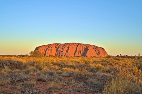 Ayers Rock or Uluru respectively at sun set. Photo shot in 2020