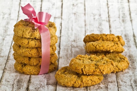 Delicious biscuits on a decorative background