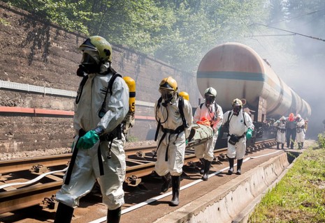 Sofia, Bulgaria - May 19, 2015: A team working with toxic acids and chemicals is saving people from
