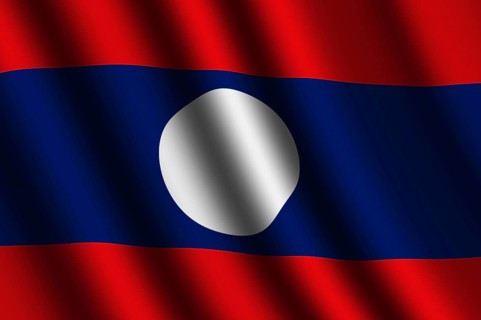 The Laotian flag flying in the wind