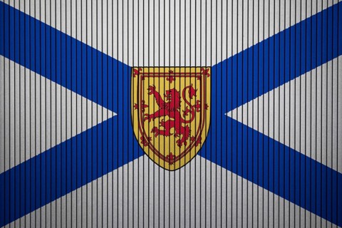 Nova Scotia Flag painted on the cracked grunge concrete wall