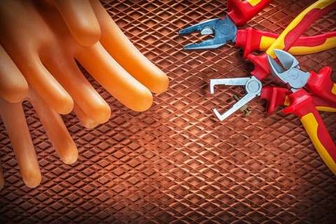 Insulation wire strippers cutter pliers insulating gloves on dielectric cover