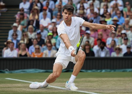 Spanish tennis player Carlos Alcaraz in action at the 2024 Wimbledon Championships, London,
