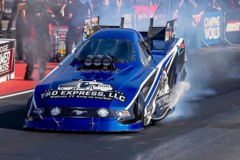 NHRA driver, Terry Haddock, prepares to qualify for the Dodge Power Brokers NHRA Mile-High