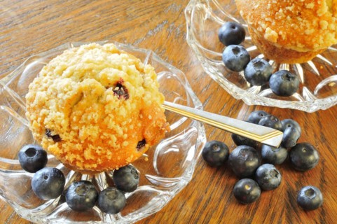 Blueberry muffins on a white plate with fresh berries, Blueberry muffins with blueberries