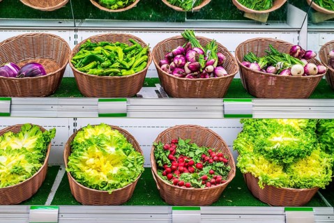 Fruits and vegetables on a supermarket shelf