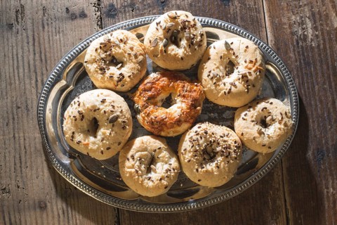 Bagels on a vintage table. Old vintage pan