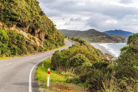 Picturesque road to Pancake Rock - natural wonder of New Zealand. West Coast of the South Island.