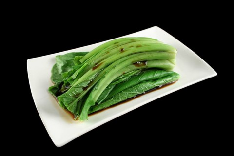 Soy sauce poured over the Asian vegetable Choy Sum