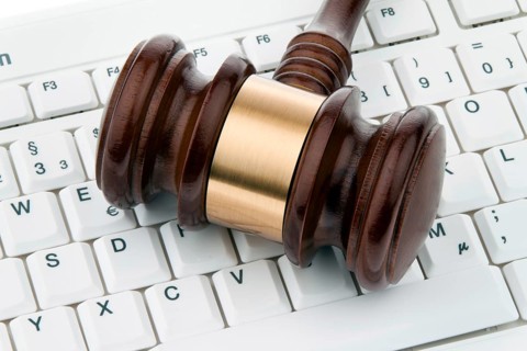 Judge's gavel and keyboard. Legal certainty on the Internet. Web auctions. Austria