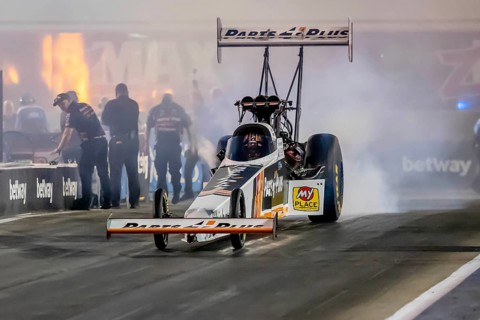 Sep 22, 2023-Concord, NC: NHRA Top Fuel Dragster Series driver, Clay Millican, runs down the lane
