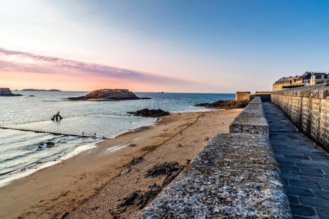 High angle view of the beach of Saint-Malo from ramparts at sunset. Brittany, France