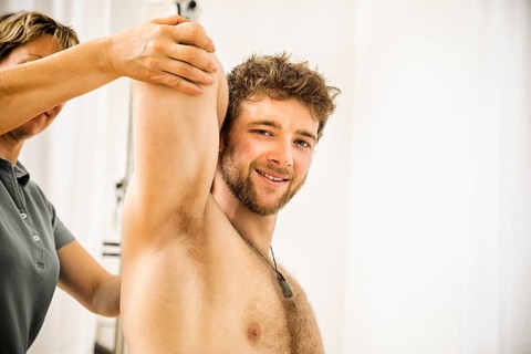 An image of a young man at the physio therapy