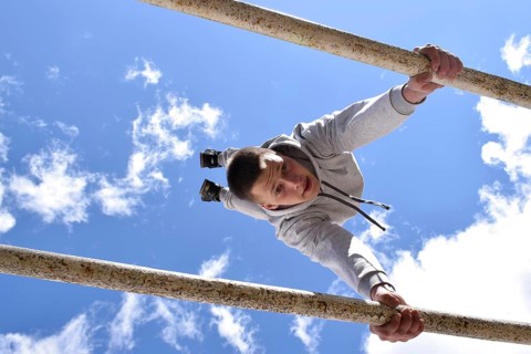 A young gymnast. Sports training for soldiers