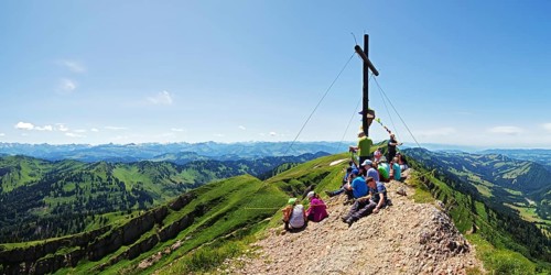 On the summit of the Rindalphorn with a view of the Allgäu Alps and the Alpine foothills,