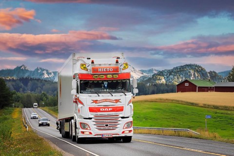 Beautifully customised DAF XF 530 semi trailer Kuljetusliike Jarmo Hieto Oy trucking along highway