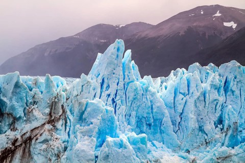 The glacier Perito Moreno. On the surface of the glacier formed Calgaspors - penitent firn.