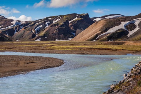 The picturesque valley in the national park Landmannalaugar, Iceland. Summer flood of meltwater