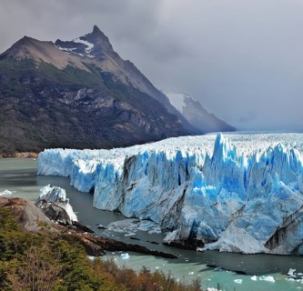 Colossal Perito Moreno glacier in Lake Argentino. Los Glaciares National Park in Argentina. Sunny