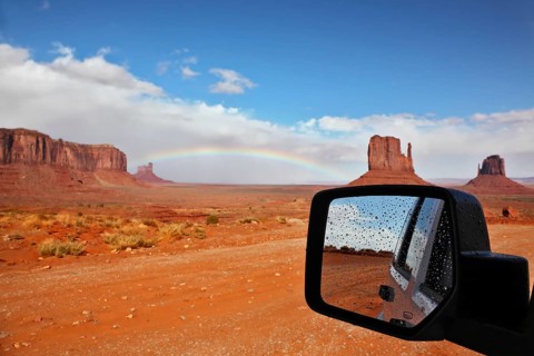 Monument Valley in the Navajo Indian Reservation. Arizona, USA. The unique red sandstone buttes are