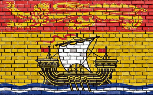 Flag of New Brunswick painted on brick wall