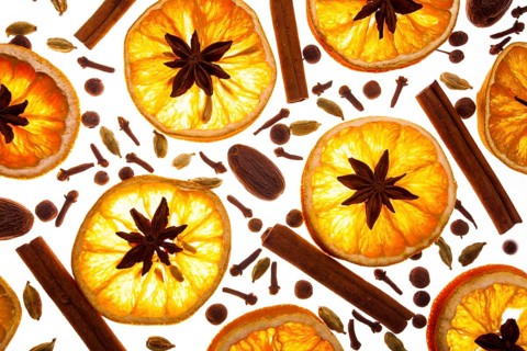 Christmas background with spices and dry orange's slices