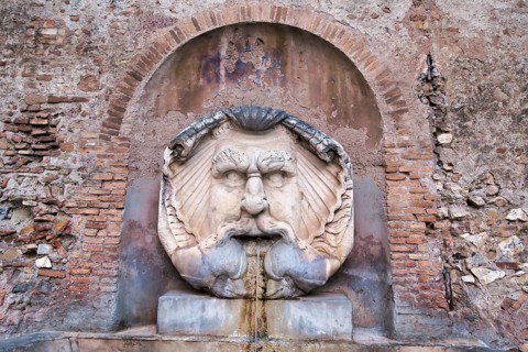 Detail of fountain in rome italy, photo as a background in old italian roman capital city, rome,