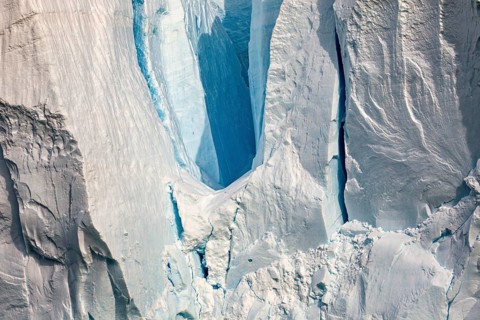 Close-up of a glacier with impressive ice formations and cool blue tones, The eternal ice of