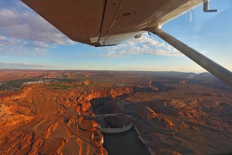 Magnificent Glenn ?anyon Dam on a sunset, photographed from the plane