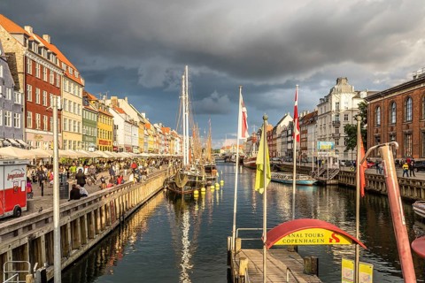 Copenhagen, Denmark, August 11, 2016: Nyhavn a cloudy day. It´s a 17th-century waterfront, canal