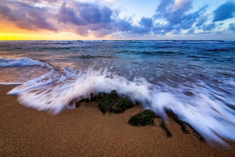 A dramatic sunset looking over the Pacific Ocean. Kauai, Hawaii
