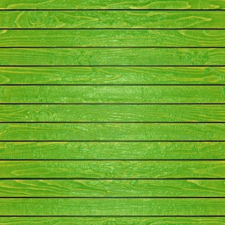 Green painted wooden planks creating a rustic and textured background, ideal for design projects