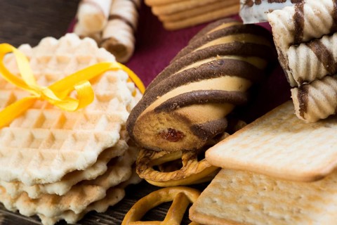 Cookies and biscuits for celebration on wooden table