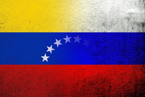 National flag of Russian Federation with The Bolivarian Republic of Venezuela National flag. Grunge