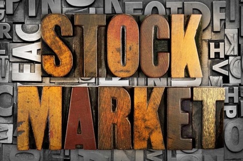 The words STOCK MARKET written in vintage letterpress type