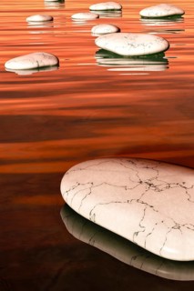 An image of some nice white step stones in the evening sea