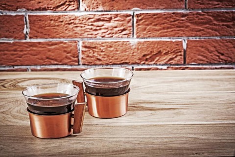 Two copper coffe cups in vintage interior