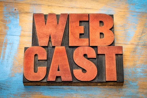 Webcast word abstract in vintage letterpress wood type agains grunge wooden background