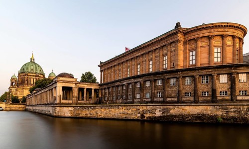 Scenic golden view of Spree river, Alte Nationalgalerie and Berlin Cathedral or Berliner Dom in