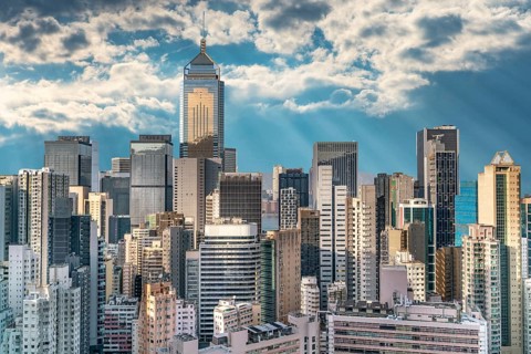 The amazing view of Hong-Kong cityscape full of skyscrapers from the rooftop