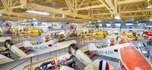 Calgary, Alberta, Canada. Aug 5, 2024. Several vintage aircraft on display in a the Hangar flight