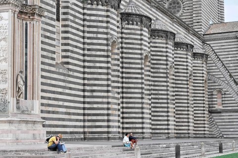 The Cathedral Basilica of Santa Maria Assunta, Orvieto, Terni, Umbria, Italy, People sitting in